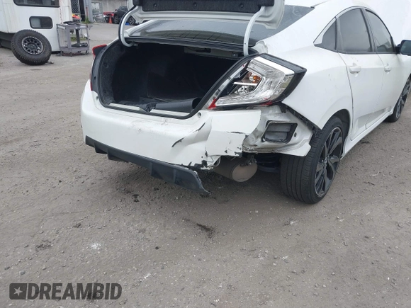 2019 Honda Civic Sport with VIN 2HGFC2F85KH512587, listed as a IAAI auction lot 41708347 with 63,895 mi miles and . Bid and sale history available at DreamBid. Image 6.