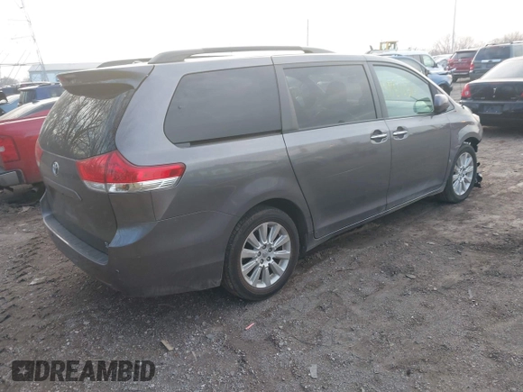 2014 Toyota Sienna Ltd with VIN 5TDDK3DC4ES087696, listed as a IAAI auction lot 41810314 with 191,852 mi miles. Bid and sale history available at carsss.com. Image 4.