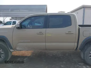 2017 Toyota Tacoma SR5 with VIN 5TFCZ5AN7HX097307, listed as a IAAI auction lot 42337528 with 98,000 mi miles and . Bid and sale history available at DreamBid. Image 14.