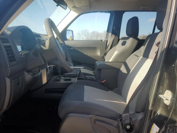 2009 Jeep Liberty Sport with VIN 1J8GN28K99W519133, listed as a Copart auction lot 51675735 with 90,864 mi miles and Salvage Title. Bid and sale history available at carsss.com. Image 7.