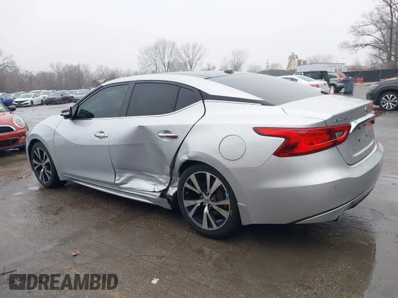 2018 Nissan Maxima SL z VIN 1N4AA6AP1JC394078, wystawiony jako IAAI lot #41197428 z przebiegiem 91 281 mil mil oraz . Historia ofert i sprzedaży dostępna na DreamBid. Obrazek 14.