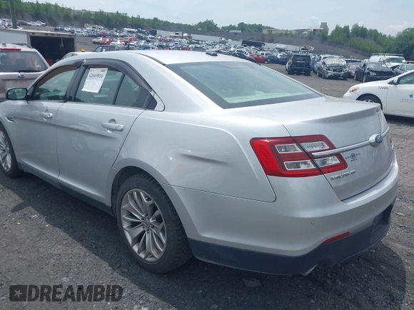 2014 Ford Taurus Limited with VIN 1FAHP2F82EG132673, listed as a IAAI auction lot 42669016 with 125,567 mi miles and . Bid and sale history available at DreamBid. Image 3.