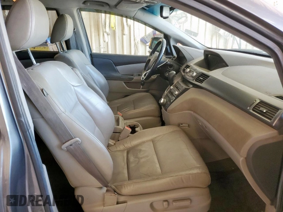 2012 Honda Odyssey Touring с VIN 5FNRL5H94CB049626, выставлен на аукционе Copart как лот 61191435 с пробегом 199 728 миль миль и Списание • Salvage title. История ставок и продаж доступна на DreamBid. Изображение 7.