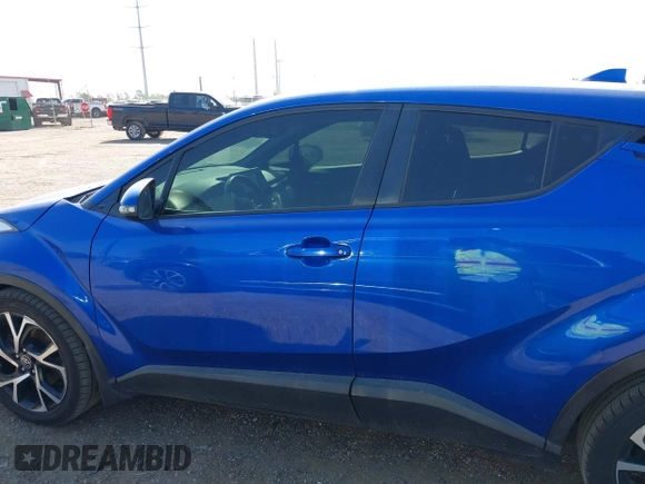 2018 Toyota C-HR XLE z VIN NMTKHMBX7JR004448, wystawiony jako IAAI lot #42785933 z przebiegiem 112 115 mil mil oraz . Historia ofert i sprzedaży dostępna na DreamBid. Obrazek 14.