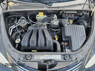 2006 Chrysler PT Cruiser Touring with VIN 3A4FY58B06T281034, listed as a Copart auction lot 62349325 with 128,688 mi miles and Salvage title. Bid and sale history available at DreamBid. Image 11.