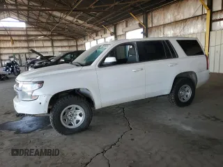 2019 Chevrolet Tahoe Commercial with VIN 1GNSKFEC4KR128319, listed as a Copart auction lot 83878674 with 129,751 mi miles and Clean title. Bid and sale history available at DreamBid. Image 1.