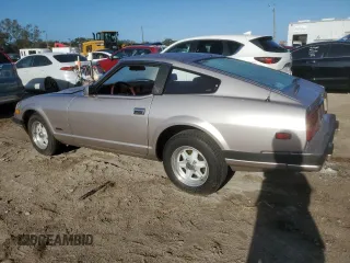 1983 Datsun 280ZX z VIN JN1HZ04S0DX560086, wystawiony jako Copart lot #79178604 z przebiegiem 183 309 mil mil oraz Szkody całkowita. Historia ofert i sprzedaży dostępna na DreamBid. Obrazek 2.