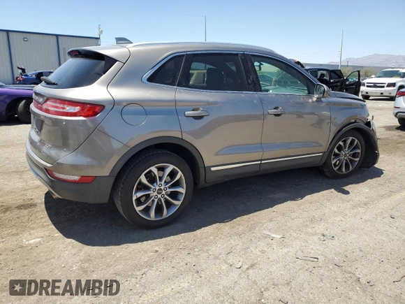 2017 Lincoln MKC Select with VIN 5LMCJ2C9XHUL34775, listed as a Copart auction lot 61188315 with 96,087 mi miles and Salvage title. Bid and sale history available at DreamBid. Image 3.