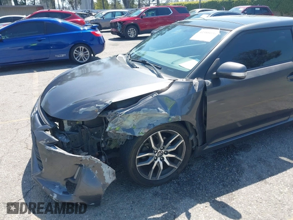 2015 Scion tC with VIN JTKJF5C74F3090309, listed as a IAAI auction lot 41988036 with 158,240 mi miles. Bid and sale history available at carsss.com. Image 6.