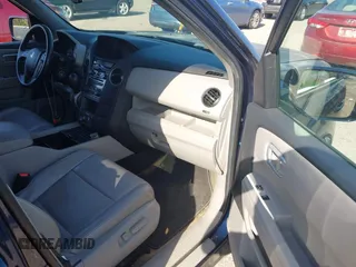 2014 Honda Pilot Touring with VIN 5FNYF4H92EB019248, listed as a IAAI auction lot 41942963 with 136,183 mi miles and . Bid and sale history available at carsss.com. Image 5.