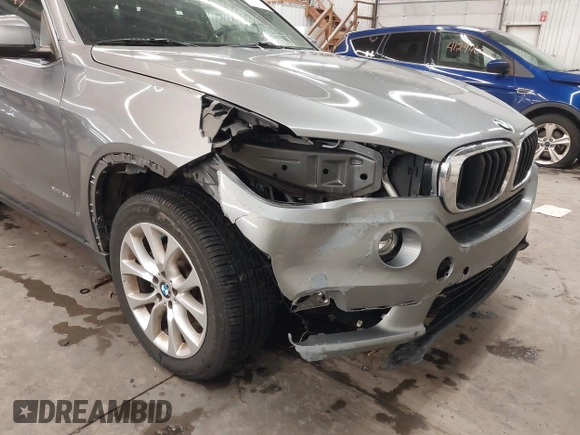 2016 BMW X5 xDrive35i z VIN 5UXKR0C5XG0U12540, wystawiony jako IAAI lot #41179965 z przebiegiem 75 997 mil mil oraz . Historia ofert i sprzedaży dostępna na DreamBid. Obrazek 6.