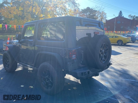 2017 Jeep Wrangler Willys Wheeler z VIN 1C4AJWAGXHL602088, wystawiony jako Copart lot #80106684 z przebiegiem 101 804 mil mil oraz Czysty tytuł • Clean title. Historia ofert i sprzedaży dostępna na DreamBid. Obrazek 3.
