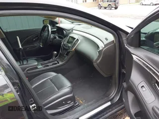 2014 Buick LaCrosse Premium II with VIN 1G4GF5G39EF172201, listed as a IAAI auction lot 41963281 with 106,231 mi miles and . Bid and sale history available at DreamBid. Image 5.