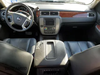 2009 GMC Yukon SLT w/4SA with VIN 1GKFC33J99R148006, listed as a Copart auction lot 88668535 with 145,088 mi miles and Salvage Title. Bid and sale history available at carsss.com. Image 8.