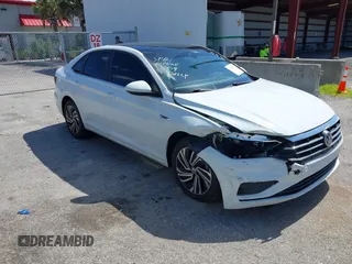 2021 Volkswagen Jetta SEL with VIN 3VWE57BU2MM047028, listed as a IAAI auction lot 42563875 with 56,695 mi miles and . Bid and sale history available at DreamBid. Image 1.