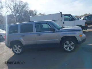 2016 Jeep Patriot High Altitude Edition with VIN 1C4NJRFB1GD712715, listed as a IAAI auction lot 41984245 with 124,227 mi miles. Bid and sale history available at carsss.com. Image 14.