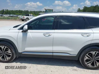 2019 Hyundai Santa Fe Limited z VIN 5NMS5CAA1KH136238, wystawiony jako IAAI lot #42314285 z przebiegiem 74 606 mil mil oraz . Historia ofert i sprzedaży dostępna na DreamBid. Obrazek 14.