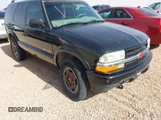 2002 Chevrolet Blazer LS z VIN 1GNDT13W42K124494, wystawiony jako IAAI lot #42266284 z przebiegiem 259 857 mil mil oraz . Historia ofert i sprzedaży dostępna na DreamBid. Obrazek 1.