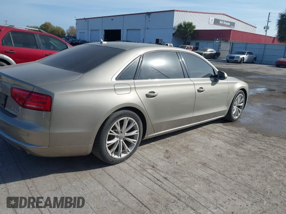 2012 Audi A8 z VIN WAURVAFD3CN024063, wystawiony jako IAAI lot #41706508 z przebiegiem Nie podano mil oraz . Historia ofert i sprzedaży dostępna na DreamBid. Obrazek 4.