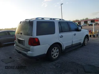 2004 Lincoln Navigator Luxury with VIN 5LMFU27RX4LJ34879, listed as a IAAI auction lot 42024945 with 154,667 mi miles. Bid and sale history available at carsss.com. Image 4.