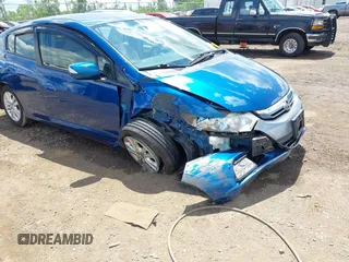 2013 Honda Insight EX with VIN JHMZE2H75DS001093, listed as a IAAI auction lot 42346816 with 153,488 mi miles and . Bid and sale history available at DreamBid. Image 6.