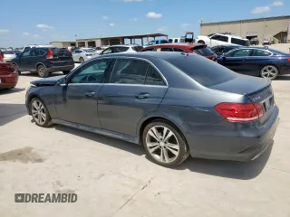2014 Mercedes-Benz E 350 Luxury with VIN WDDHF8JB2EA904410, listed as a Copart auction lot 65151415 with 158,946 mi miles and Salvage title. Bid and sale history available at DreamBid. Image 2.