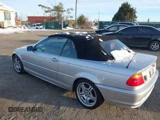 2001 BMW 3 Series 330Ci with VIN WBABS53421JU82591, listed as a IAAI auction lot 41277310 with 99,109 mi miles. Bid and sale history available at carsss.com. Image 3.