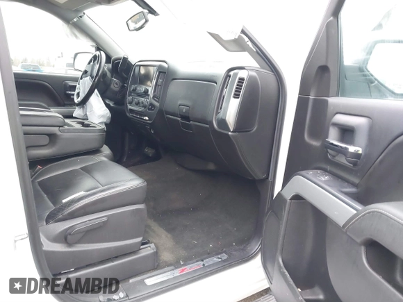 2014 Chevrolet Silverado 1500 LT with VIN 1GCVKREC2EZ390061, listed as a IAAI auction lot 40824477 with 140,928 mi miles and . Bid and sale history available at DreamBid. Image 5.