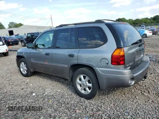 2006 GMC Envoy SLT with VIN 1GKDT13S962305588, listed as a Copart auction lot 69196964 with 118,289 mi miles and Salvage Title. Bid and sale history available at DreamBid. Image 2.