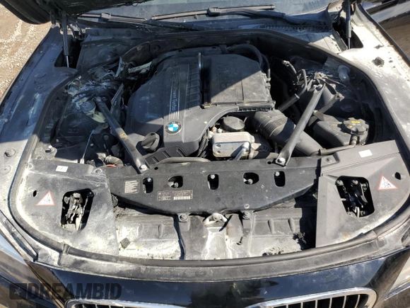 2015 BMW 7 Series 740i with VIN WBAYA6C5XFD826895, listed as a Copart auction lot 66889794 with Not Provided miles and Salvage Title. Bid and sale history available at DreamBid. Image 13.