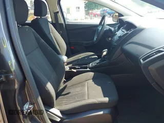 2015 Ford Focus SE with VIN 1FADP3F25FL300945, listed as a IAAI auction lot 42483699 with 76,992 mi miles and . Bid and sale history available at DreamBid. Image 5.