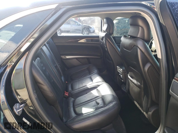 2014 Lincoln MKZ z VIN 3LN6L2GK3ER802789, wystawiony jako Copart lot #86357034 z przebiegiem 215 548 mil mil oraz Szkoda całkowita • Salvage title. Historia ofert i sprzedaży dostępna na DreamBid. Obrazek 10.
