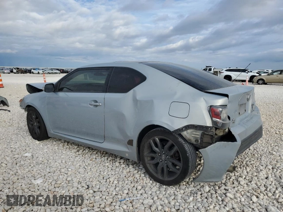 2014 Scion tC z VIN JTKJF5C79E3067932, wystawiony jako Copart lot #50425555 z przebiegiem Nie podano mil oraz Szkody całkowita. Historia ofert i sprzedaży dostępna na DreamBid. Obrazek 2.