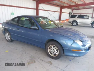 1997 Pontiac Sunfire SE z VIN 3G2JB1249VS803043, wystawiony jako IAAI lot #42333346 z przebiegiem 149 628 mil mil oraz . Historia ofert i sprzedaży dostępna na DreamBid. Obrazek 1.