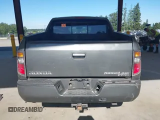 2007 Honda Ridgeline RTL with VIN 2HJYK16537H529904, listed as a IAAI auction lot 42626859 with 294,953 mi miles and . Bid and sale history available at DreamBid. Image 16.