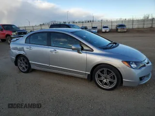 2010 Acura CSX Technology z VIN 2HHFD5F77AH201887, wystawiony jako Copart lot #77610604 z przebiegiem 94 442 mil mil oraz Szkody całkowita. Historia ofert i sprzedaży dostępna na DreamBid. Obrazek 4.