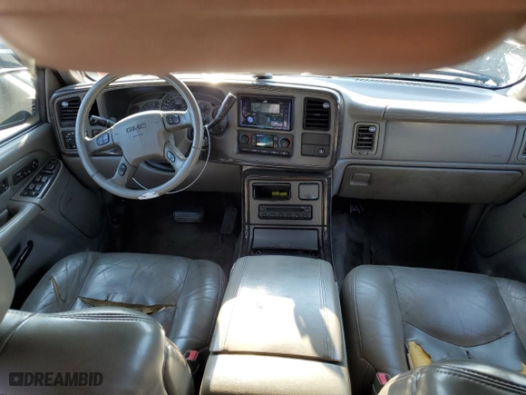 2004 GMC Yukon Denali with VIN 1GKEK63U74J212674, listed as a Copart auction lot 69704734 with 174,893 mi miles and Salvage Title. Bid and sale history available at carsss.com. Image 8.