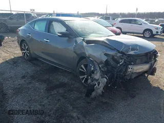 2018 Nissan Maxima SV z VIN 1N4AA6AP5JC386940, wystawiony jako IAAI lot #41672973 z przebiegiem 102 309 mil mil oraz . Historia ofert i sprzedaży dostępna na DreamBid. Obrazek 1.
