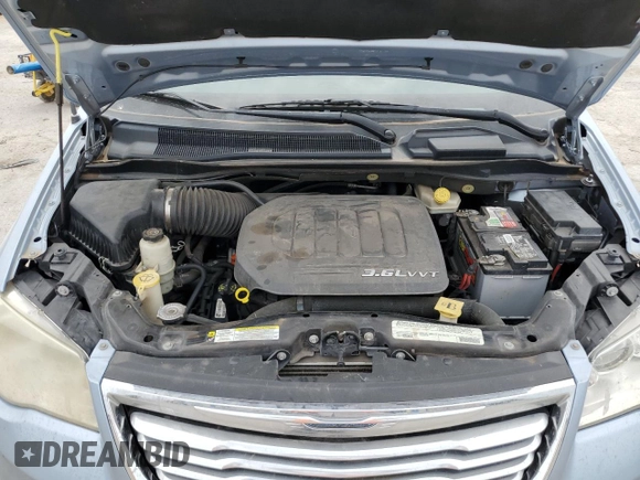 2012 Chrysler Town & Country Limited z VIN 2C4RC1GGXCR394219, wystawiony jako Copart lot #57032565 z przebiegiem Nie podano mil oraz Szkoda całkowita • Salvage title. Historia ofert i sprzedaży dostępna na DreamBid. Obrazek 12.