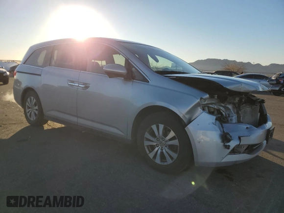 2015 Honda Odyssey EX-L with VIN 5FNRL5H69FB077433, listed as a Copart auction lot 88999285 with 193,926 mi miles and Salvage Title. Bid and sale history available at DreamBid. Image 4.