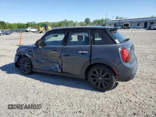 2020 MINI Hardtop 4 Door Cooper S z VIN WMWXU9C02L2M29164, wystawiony jako Copart lot #53538275 z przebiegiem 60 076 mil mil oraz Szkody całkowita. Historia ofert i sprzedaży dostępna na DreamBid. Obrazek 2.