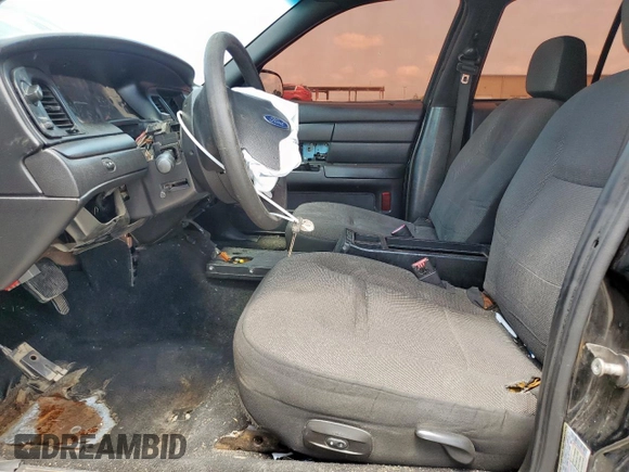 2010 Ford Police Interceptor with VIN 2FABP7BV9AX110091, listed as a Copart auction lot 60065205 with Not provided miles and Salvage title. Bid and sale history available at DreamBid. Image 7.