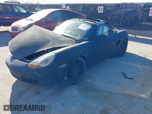 1998 Porsche Boxster с VIN WP0CA2982WU621935, выставлен на аукционе IAAI как лот 41838363 с пробегом Не указан миль и . История ставок и продаж доступна на DreamBid. Изображение 2.