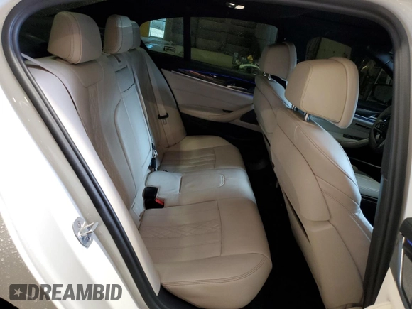 2018 BMW 5 Series M550i xDrive with VIN WBAJB9C5XJB035514, listed as a Copart auction lot 50045425 with 76,325 mi miles and Salvage Title. Bid and sale history available at carsss.com. Image 10.