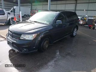 2013 Dodge Journey R/T with VIN 3C4PDCEG7DT682670, listed as a IAAI auction lot 42057985 with 221,755 mi miles and . Bid and sale history available at DreamBid. Image 2.