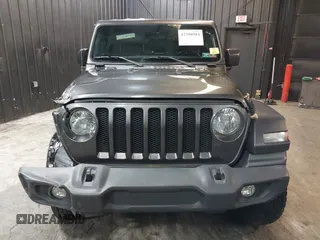 2018 Jeep Wrangler Unlimited Sport S with VIN 1C4HJXDG5JW126496, listed as a IAAI auction lot 42390584 with 163,476 mi miles and . Bid and sale history available at DreamBid. Image 13.
