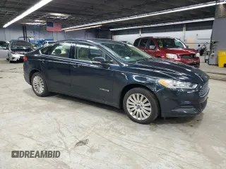2014 Ford Fusion SE Hybrid with VIN 3FA6P0LUXER220313, listed as a Copart auction lot 55678335 with 183,466 mi miles and Clean Title. Bid and sale history available at DreamBid. Image 4.