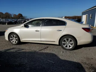 2012 Buick LaCrosse Premium 2 with VIN 1G4GG5E3XCF217529, listed as a Copart auction lot 79520674 with 118,448 mi miles and Clean title. Bid and sale history available at DreamBid. Image 2.
