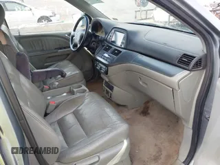 2007 Honda Odyssey EX-L z VIN 5FNRL38717B002725, wystawiony jako IAAI lot #42177209 z przebiegiem 226 706 mil mil oraz . Historia ofert i sprzedaży dostępna na DreamBid. Obrazek 5.
