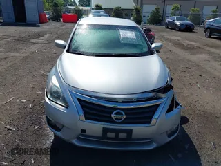 2015 Nissan Altima 2.5 z VIN 1N4AL3AP2FC591986, wystawiony jako IAAI lot #42172883 z przebiegiem 205 419 mil mil oraz . Historia ofert i sprzedaży dostępna na DreamBid. Obrazek 12.